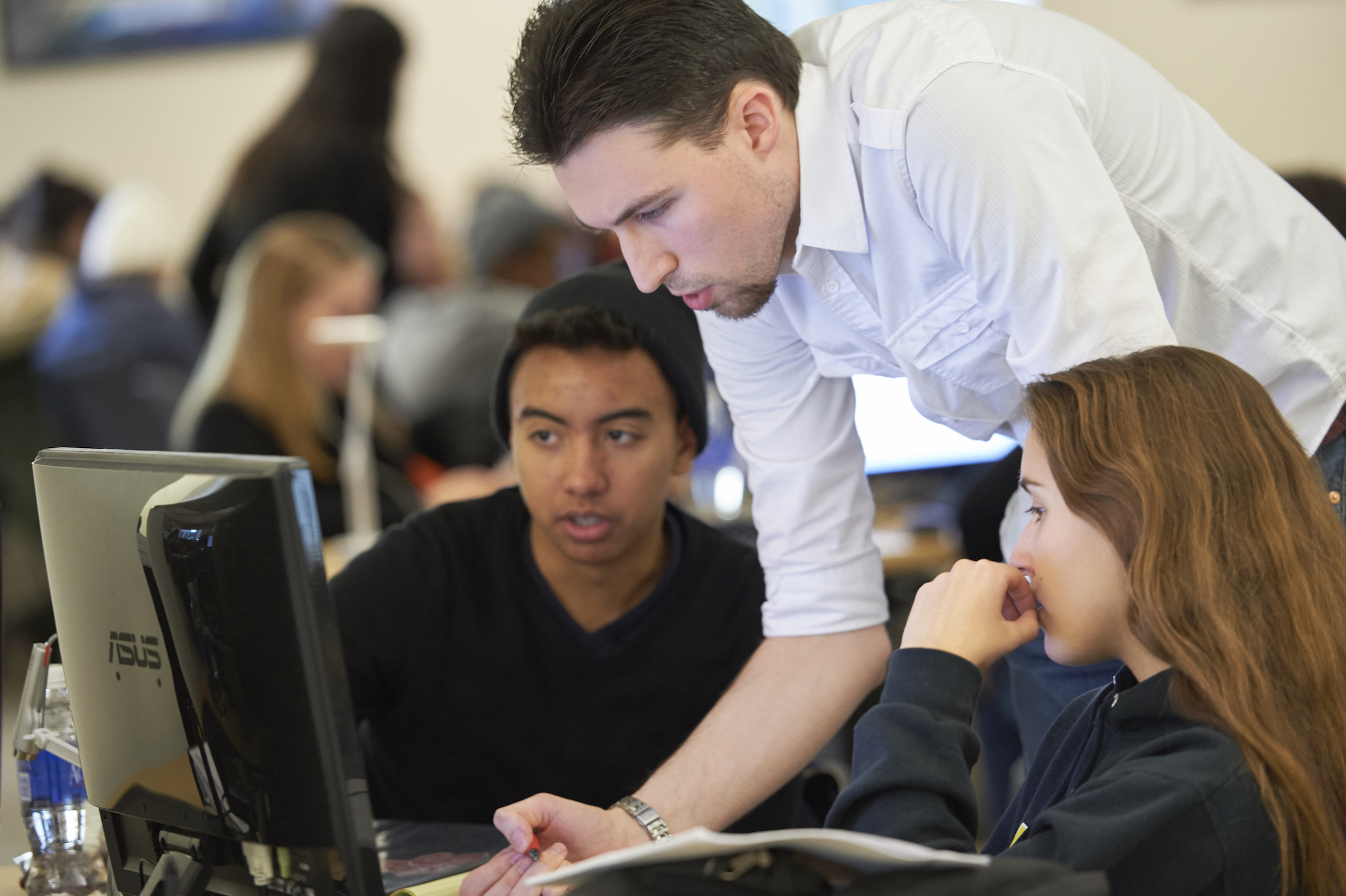 Three people working