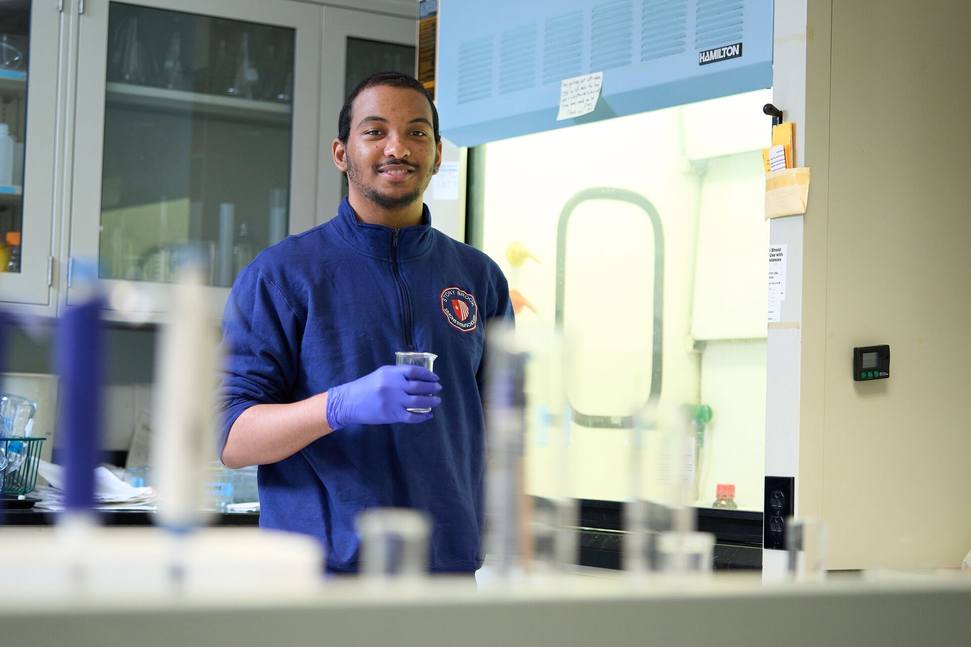 Scholar working in the lab