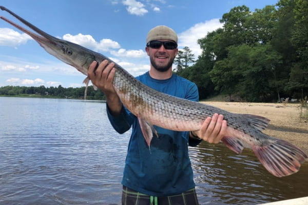 Brian Gallagher holds a gar