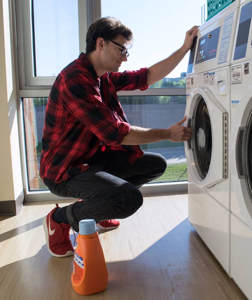 Student in laundry room